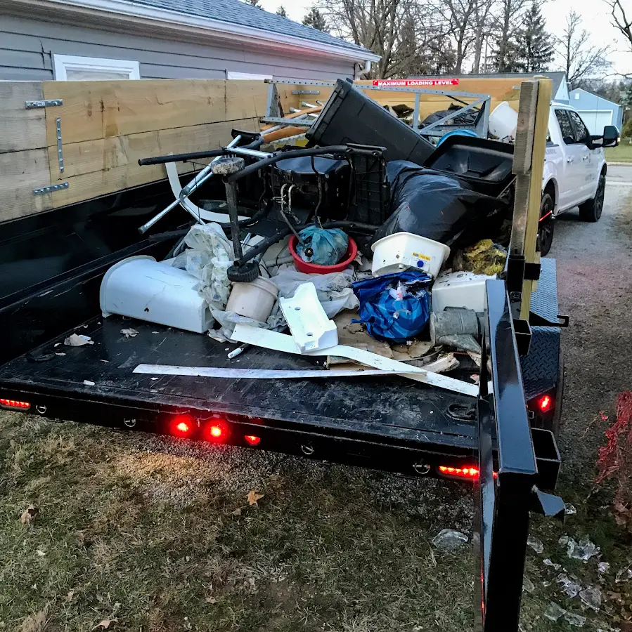 Roll-off dumpster delivered to a residential driveway in Columbia